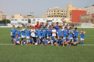 Foto de familia de los alumnos participantes junto a los entrenadores