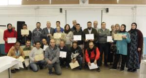 El consejero, profesores y alumnos en una gran foto de familia