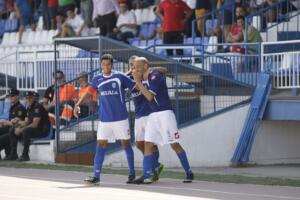 Los melillenses Mahanan, Amarito y Chota celebran el gol conseguido por éste último (74’) en la victoria ante el filial granadino por 4-1 en la temporada 2013-14