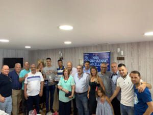 Componentes de la Peña Nacho Aznar junto con los galardonados