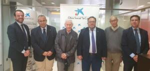 Representantes de La Caixa y de La Salle en la firma del acuerdo