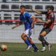 Jugadores de U.D. Melilla B y Atlético Porcuna en un partido de fútbol