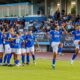 Jugadores de la U.D. Melilla celebrando un gol en el estadio.