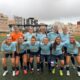 Jugadoras del equipo femenino de ATM Melilla posando en el campo