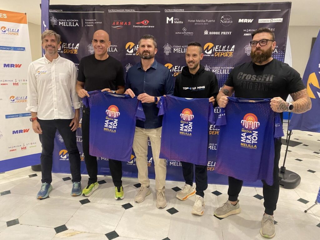 Reyes Estévez y organizadores en la presentación de la Media Maratón de Melilla