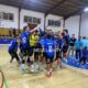 Jugadores del Balonmano Virgen de la Victoria celebrando una victoria emocionante.