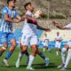 Jugadores de U.D. Melilla y Águilas CF en acción durante el partido