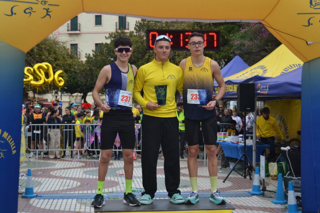 Tres atletas en el podio de la San Silvestre de Melilla 2025