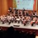 Orquesta y coro en el escenario durante el concierto de Navidad en Melilla