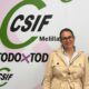 Participante en evento de CSIF en Melilla con fondo de logo