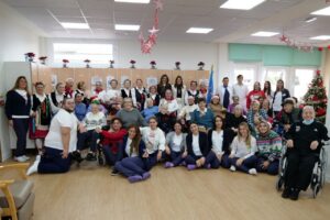 Grupo de personas en la inauguración del Centro de Estancias Diurnas en Melilla