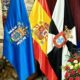 Banderas de Ceuta y Melilla junto a la bandera de España