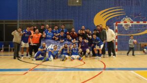 Jugadores del Nueva Era Melilla F.S. celebrando en el Pabellón García Pezzi