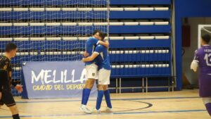 Jugadores del Nueva Era Melilla celebrando un gol en el Pabellón Príncipe de Asturias.