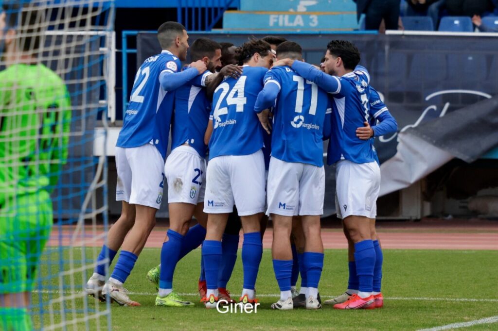 Jugadores de la U.D. Melilla celebrando un gol en el estadio