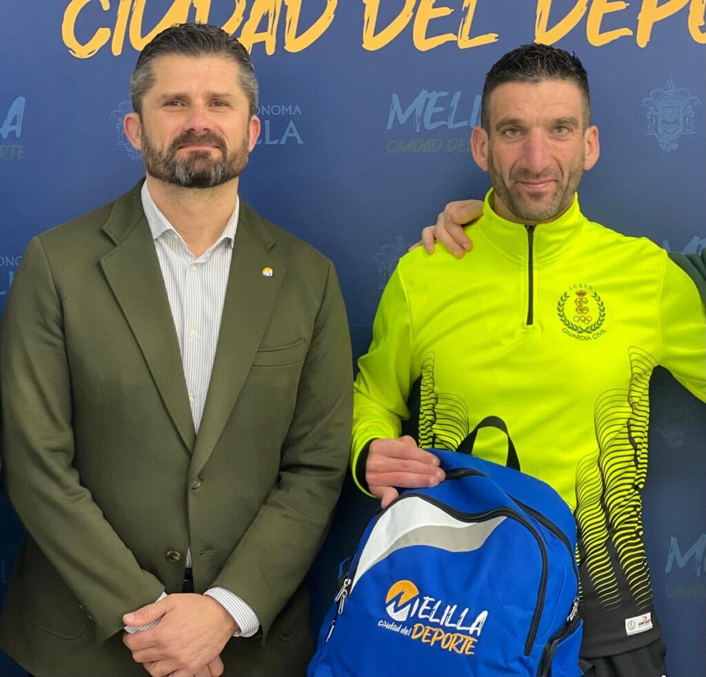 El consejero de Deporte y Jesús Mosquera en un evento deportivo