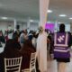 Evento benéfico de Ramadán en Melilla con mujeres disfrutando de un iftar comunitario
