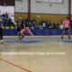Jugadores de balonmano en acción durante un partido emocionante en Melilla.