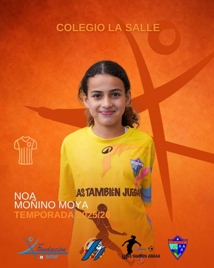 Niña sonriente con camiseta amarilla del Colegio La Salle