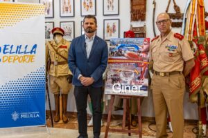 Presentación del IX Desafío Melilla con autoridades y cartel del evento