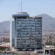 Edificio del Gobierno de Melilla con fondo montañoso