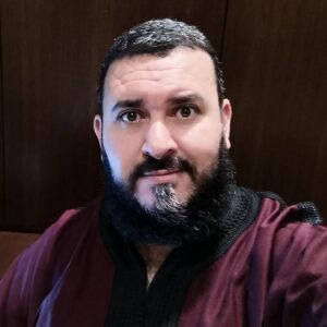Retrato de Malik Benaisa, filólogo y profesor en la UGR.
