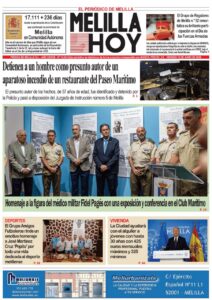 Portada de El Melilla. Fotografía principal: varios oficiales y militares en una exposición dedicada al médico militar Fidel Pagés junto a paneles informativos en una sala de exposición azul.