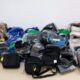 Conjunto de bolsos falsificados aprehendidos por la Guardia Civil en el aeropuerto.