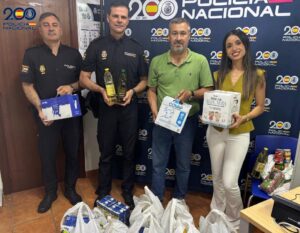 Entrega de donaciones por la Policía Nacional al Banco de Alimentos en Melilla