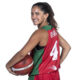 Inés Vieira posando con un balón de baloncesto en su uniforme