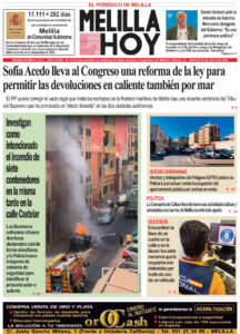 Front page of the Spanish newspaper Melilla Hoy with a bold main headline about a reform, and a central photo showing a smoky street fire with emergency responders nearby.