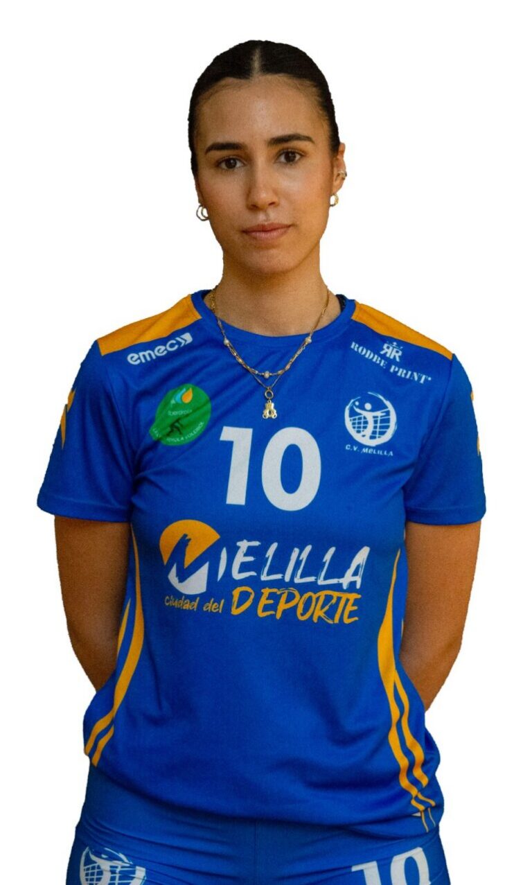 Person wearing a blue sports jersey with the number 10, standing with hands behind back; team logos and 'CIUDAD DEL DEPORTE' text are visible on the shirt.