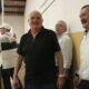 Homenaje a Antonio Potous con amigos en un evento deportivo