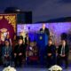 Acto del gobierno en Ceuta con varias personas en el escenario