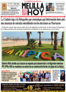 Front page of Melilla Hoy newspaper; beach photo at La Hípica with colorful letters spelling ‘LA HÍPICA’ on the grass and bold headlines about political news.