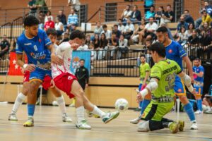 Jugadores de fútbol sala en un partido entre Melistar y Leganés