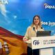 Sofía Acedo aparece ante un atril del Partido Popular en Melilla.